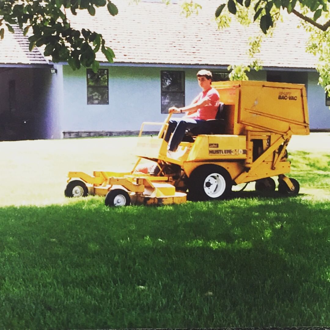 person cutting the grass